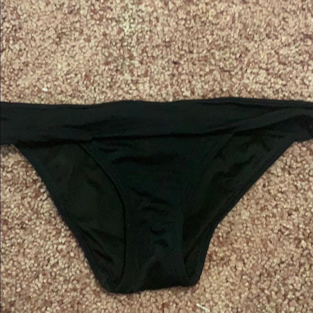 Black Victoria’s Secret bikini bottoms